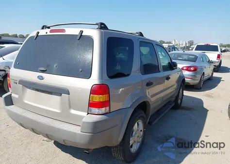 2001 Ford Escape Xlt z USA, uszkodzony, nr VIN 1FMYU03131KA15458